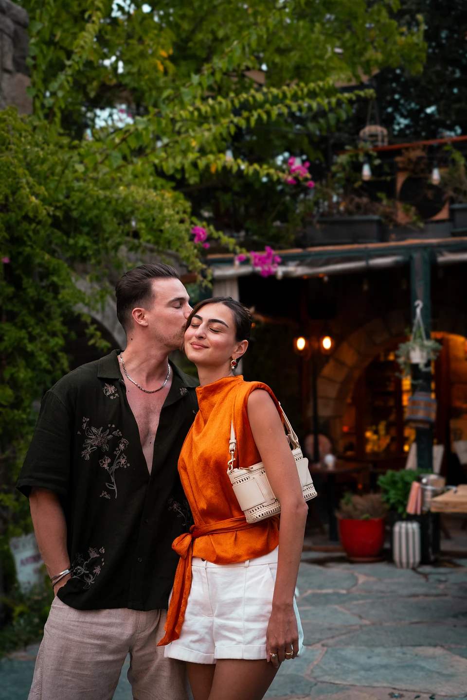 Ipek and Robbe under lanterns in Bodrum